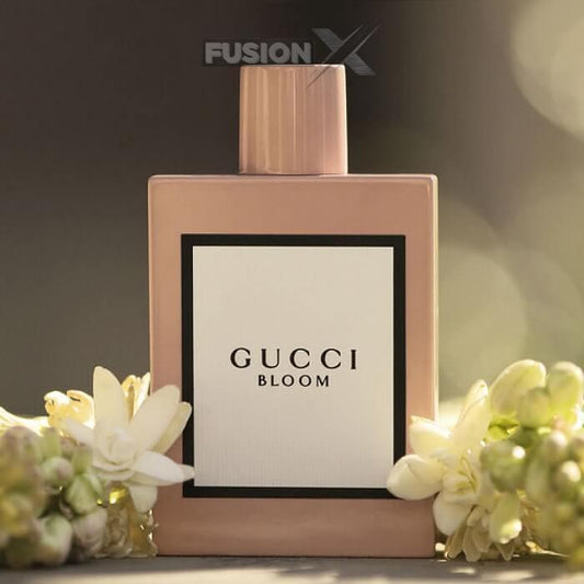 Gucci Bloom perfume bottle featuring a floral-inspired design.
