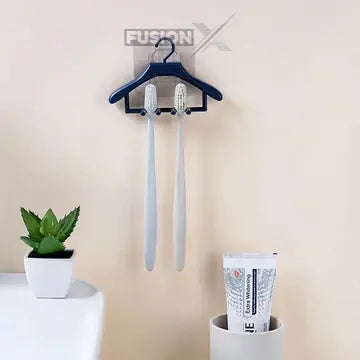 Hanger-style toothbrush holder for easy bathroom organization.
